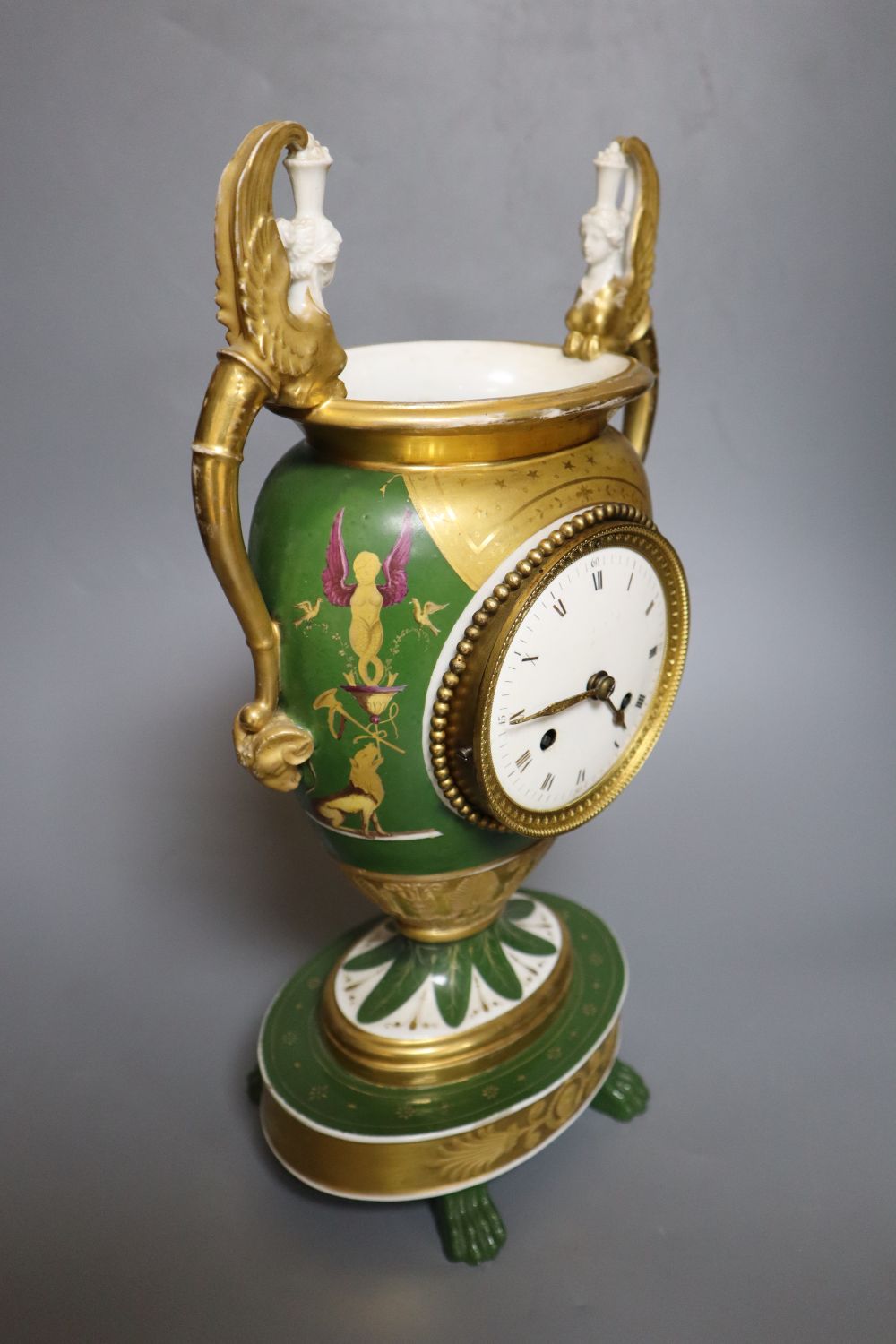 A 19th century French porcelain mantel clock, height 37cm